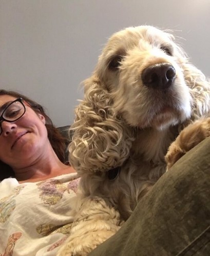 Rachel resting with dog